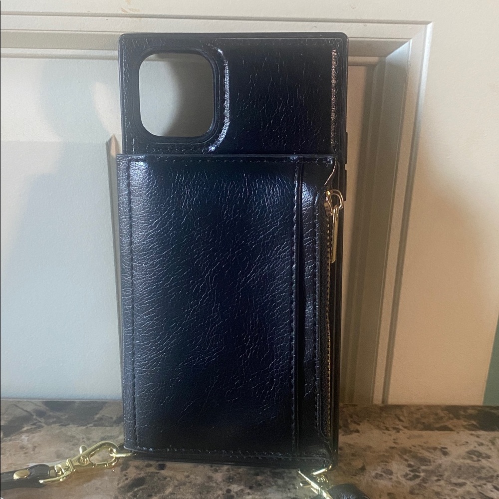 iPhone 11 Pro Max phone case.  Leather with Strap